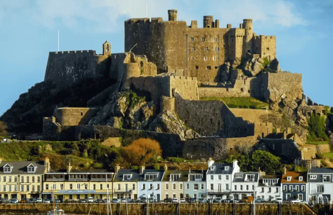 Mont Orgueil Castle in Jersey, perched on a hill above the coastline.