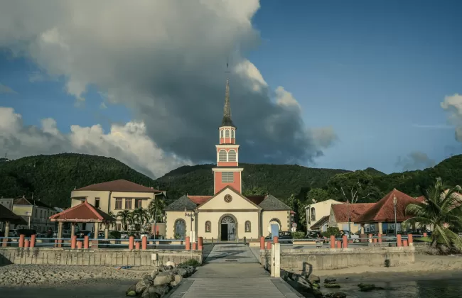 Colonial-style church in a town square.