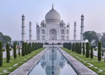 The Taj Mahal in India, viewed from the front with its reflecting pool.