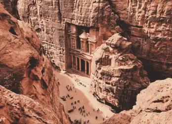 Petra’s rock-carved architecture in Jordan, with reddish sandstone cliffs.