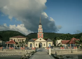 Colonial-style church in a town square.