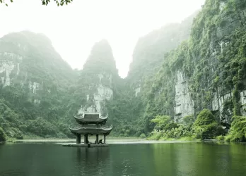agoda-surrounded-by-body-of-water-and-mountains